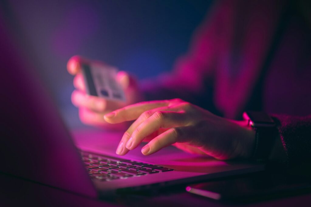 Closeup of an insider entering personal information in a cyber security insider threat event