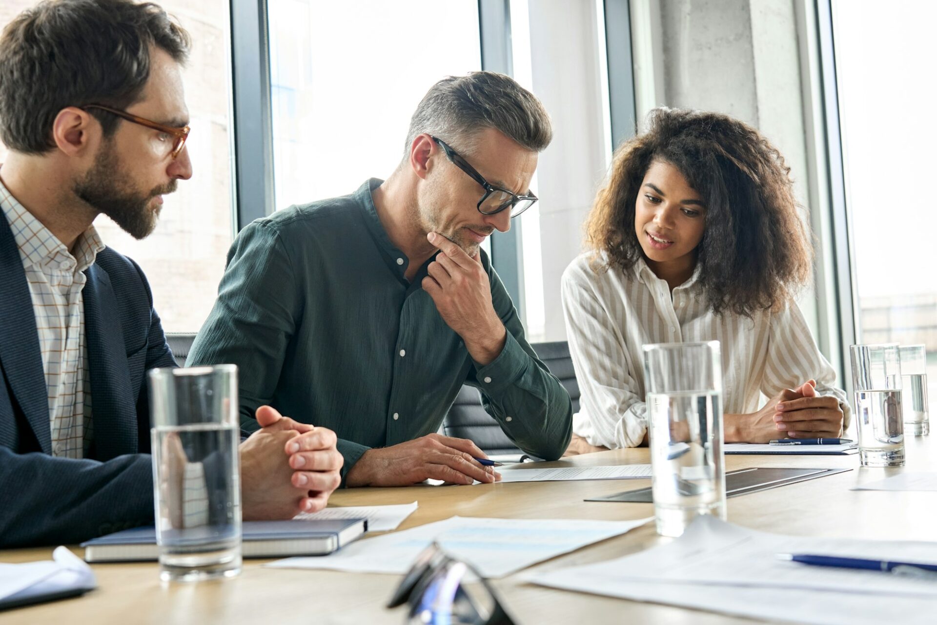 focused-mature-businessman-considering-risks