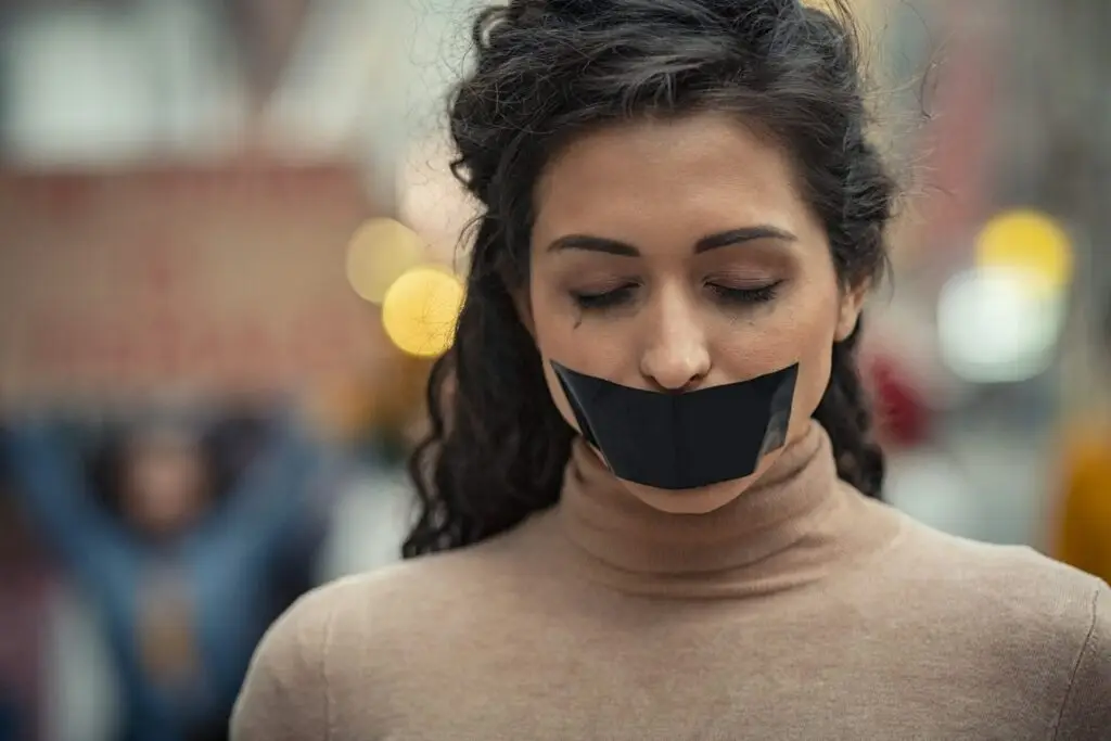 woman-fighting-against-harassment-with-closed-eyes – United Outcomes – United Outcomes woman-fighting-against-harassment-with-closed-eyes