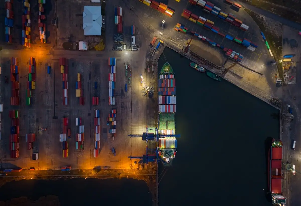 Aerial drone view of Large car cargo ferry boat ship entering the port in Varna – United Outcomes – United Outcomes