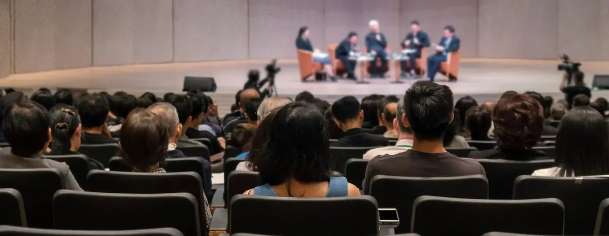 Rear view of the Audience is large enough for Martyn's law to apply in a conference hall or seminar meeting.
